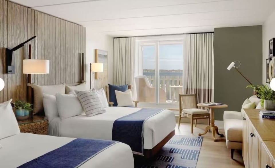 Wake up to bright coastal light and breezy balcony views.