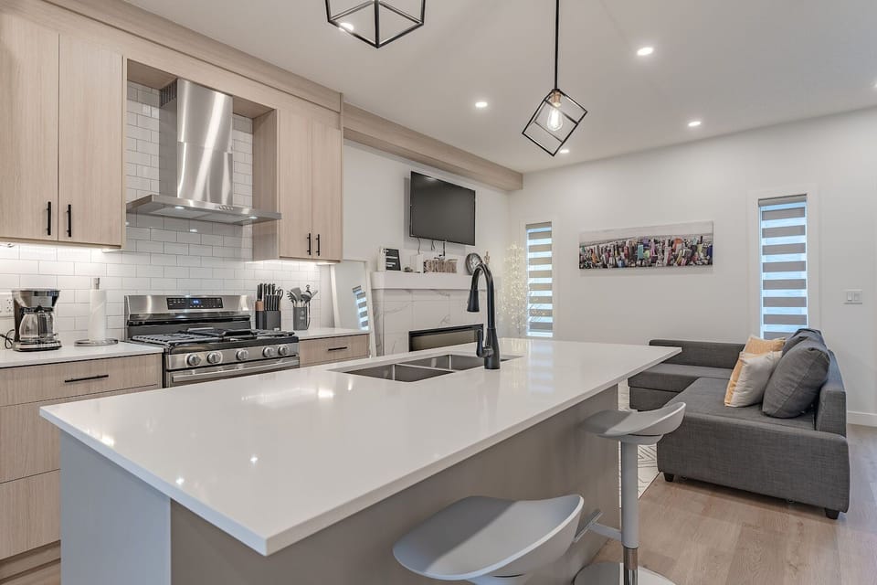 Coffee station, 5-burner gas stove, and spacious living room with Smart TV