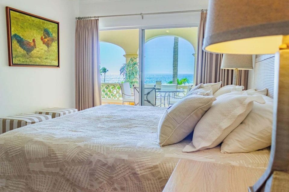 Wake up to amazing ocean views from the king bed in the 1st master