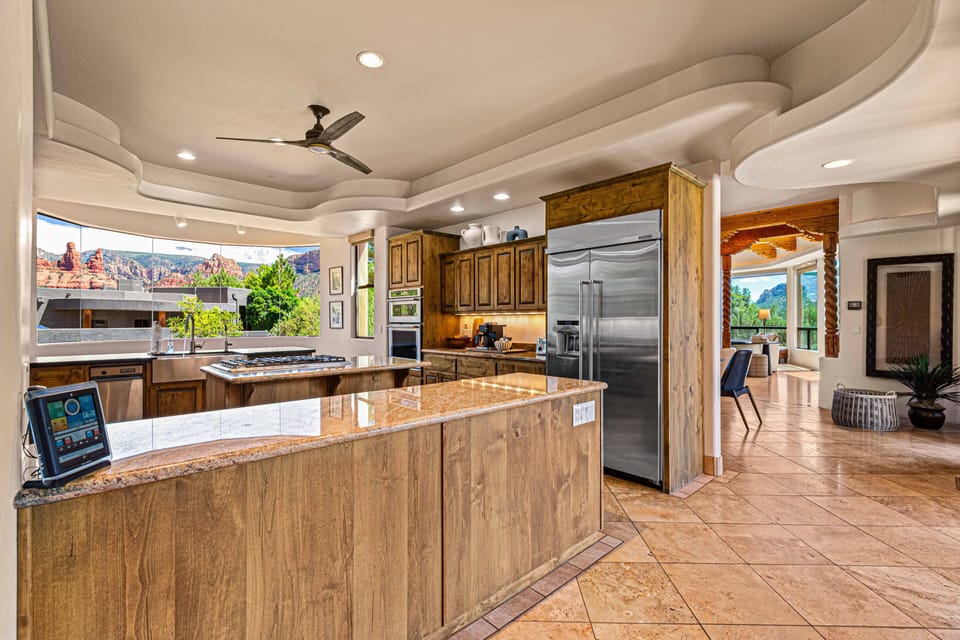 Spacious, open-concept kitchen designed for effortless movement. With a walk-in pantry for additional storage.