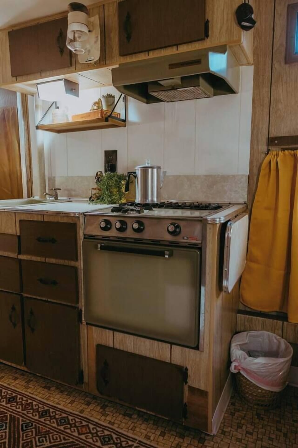 The 1973 Go-Tag-A-Long Camper offers a unique setting for photography or summer gatherings. (1)