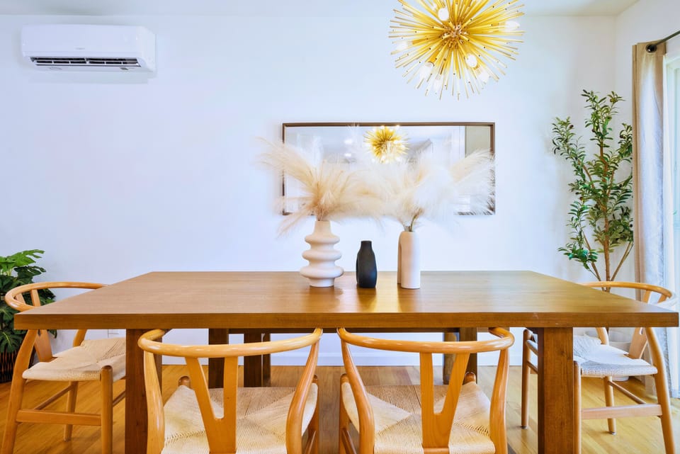 Our dining table can comfortably seat up to 7 person and we have extra chairs.