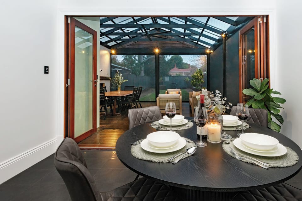 Dining Area & Outdoor Entertaining Area with Blind Down