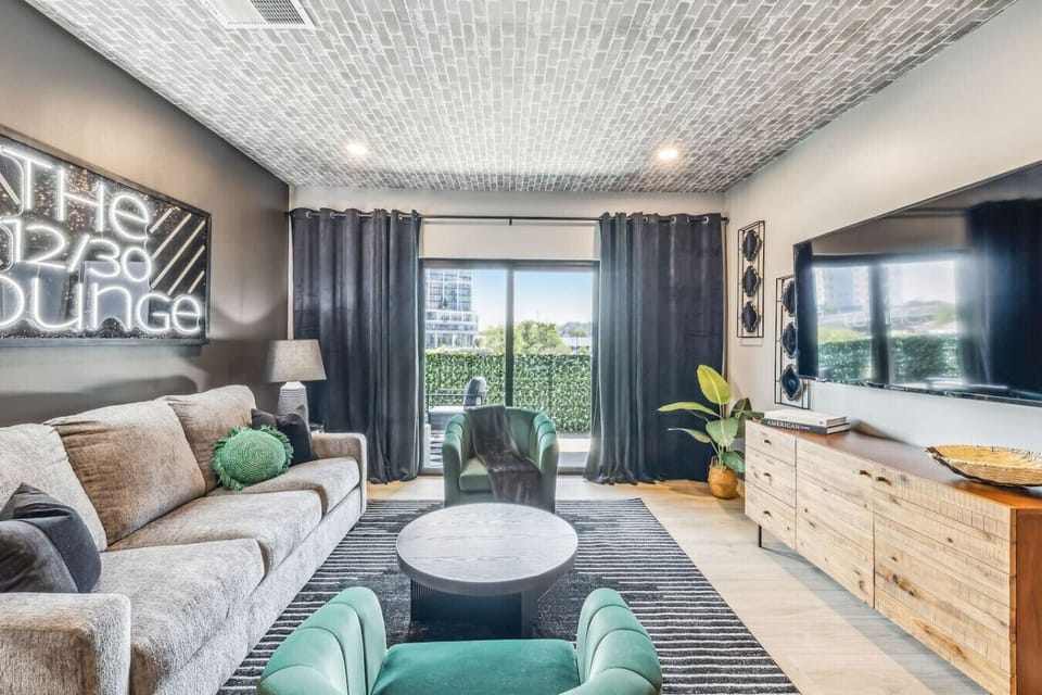 Living Room with Smart TV and patio access plus pull out queen sized sofa bed