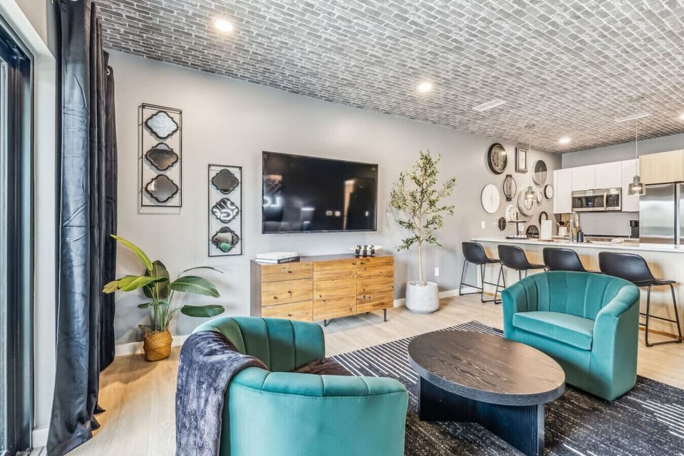 Living Room with Smart TV and patio access plus pull out queen sized sofa bed