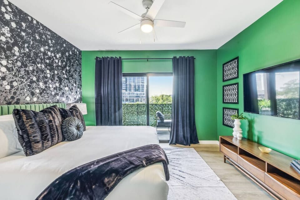 Bedroom with King Bed, Smart TV, and patio access