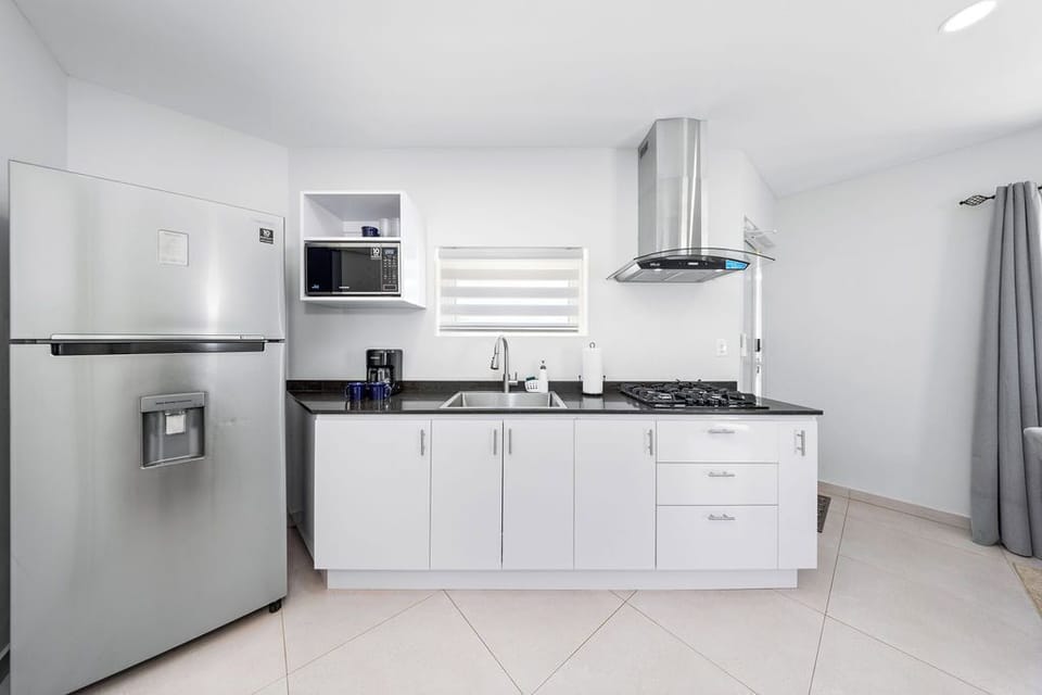 Whether you're preparing a quick breakfast or a festive dinner, you'll find everything you need at your fingertips. Enjoy the convenience of a well-stocked kitchen that makes dining in as enjoyable as exploring local eateries.