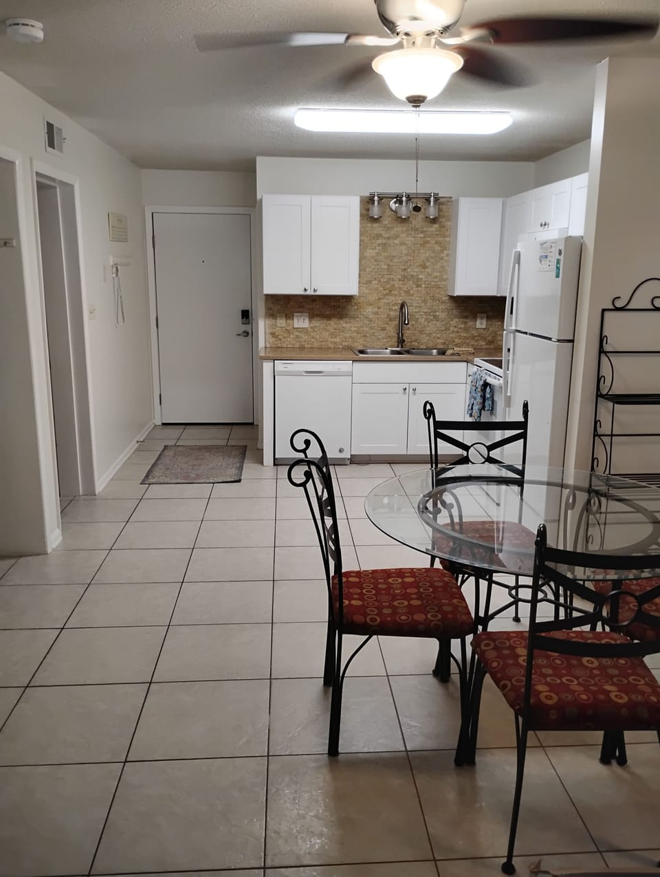 Dining room and fully stocked kitchen