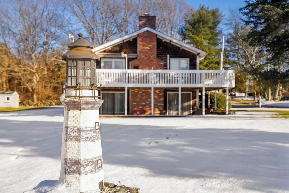 Side entrance with wrap around deck.
