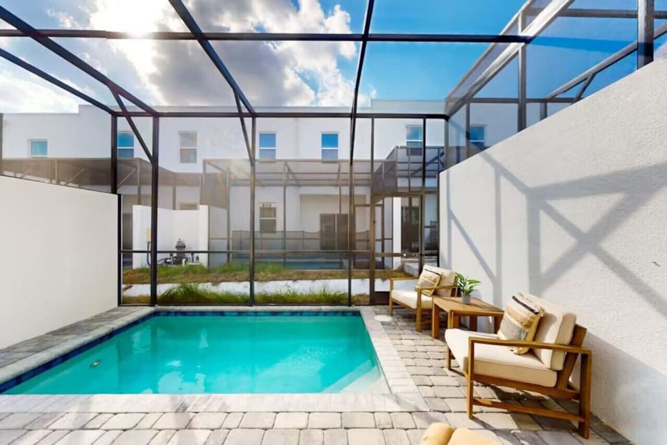 Take a dip in the private, fully fenced pool—ideal for cooling off after a day of Orlando adventures.