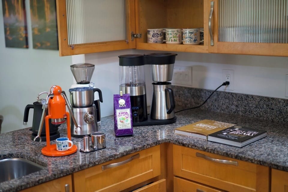 coffee gears:  grinder, dripper, milk frother, tea kettle, and manual expresso