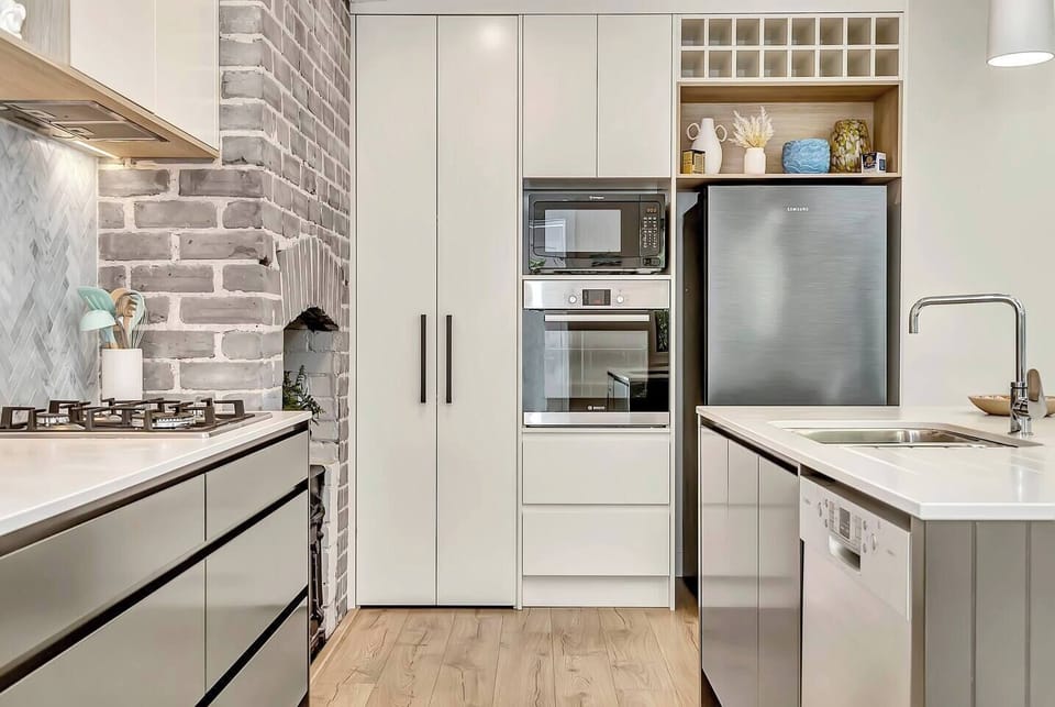  Let culinary creations come to life in the modern kitchen fitted with the basics you need and more. 
