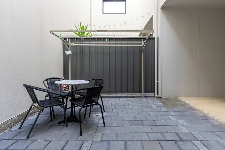 Enjoy the breeze outdoors in your private patio as you gather here for your morning coffee.