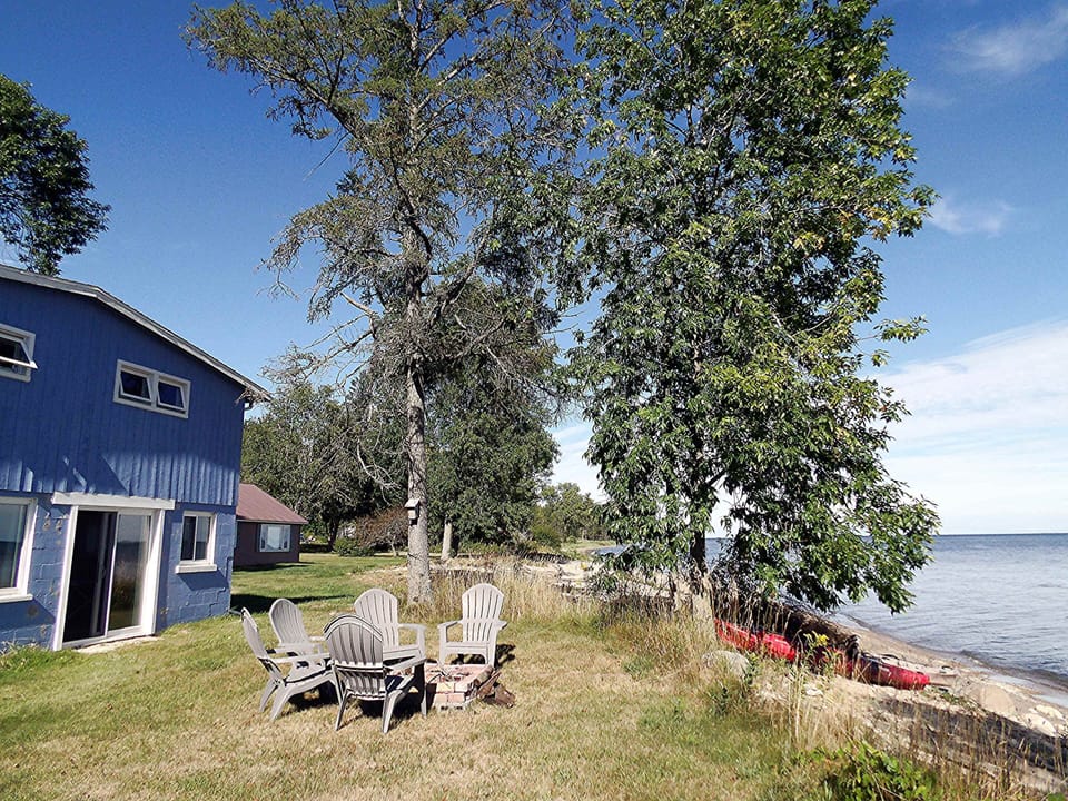 Lakeside yard and beach area