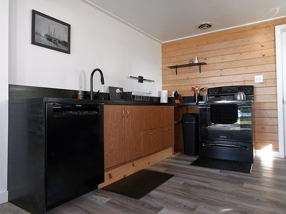 Kitchen with range oven and dishwasher