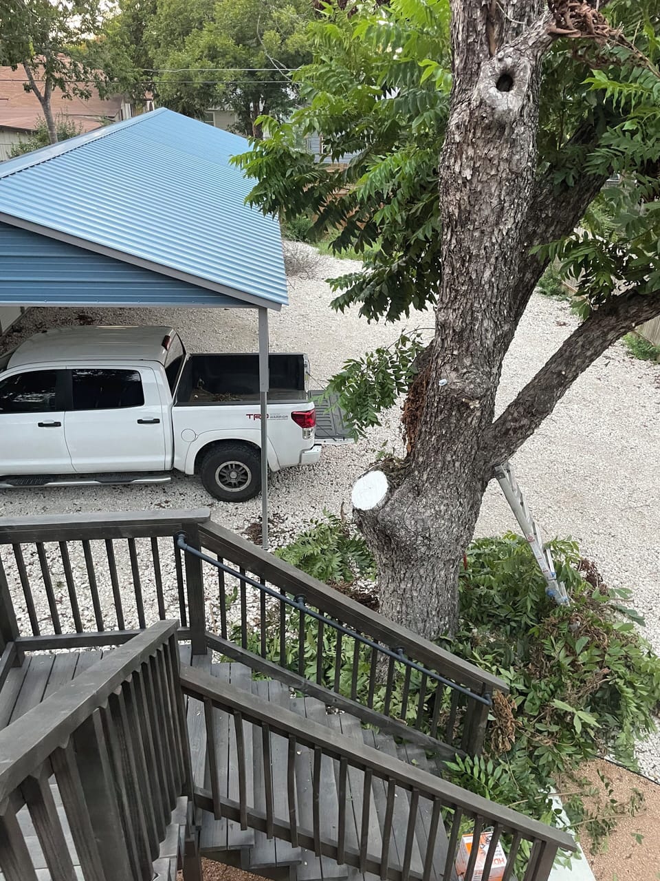 Covered parking close to rear entrance of unit.