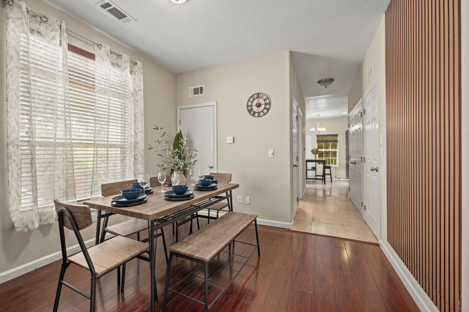 Inviting space with stylish table and seating, perfect for family meals.