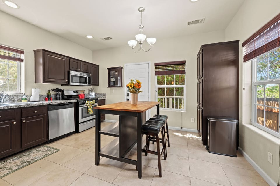 Modern appliances, ample counter space, perfect for cooking and meals.