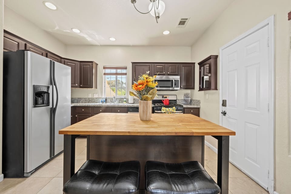Modern appliances, ample counter space, perfect for cooking and meals.
