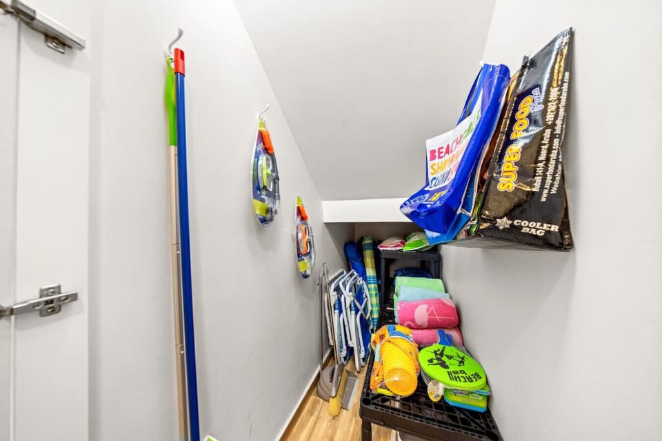 Convenient storage area stocked with beach gear.