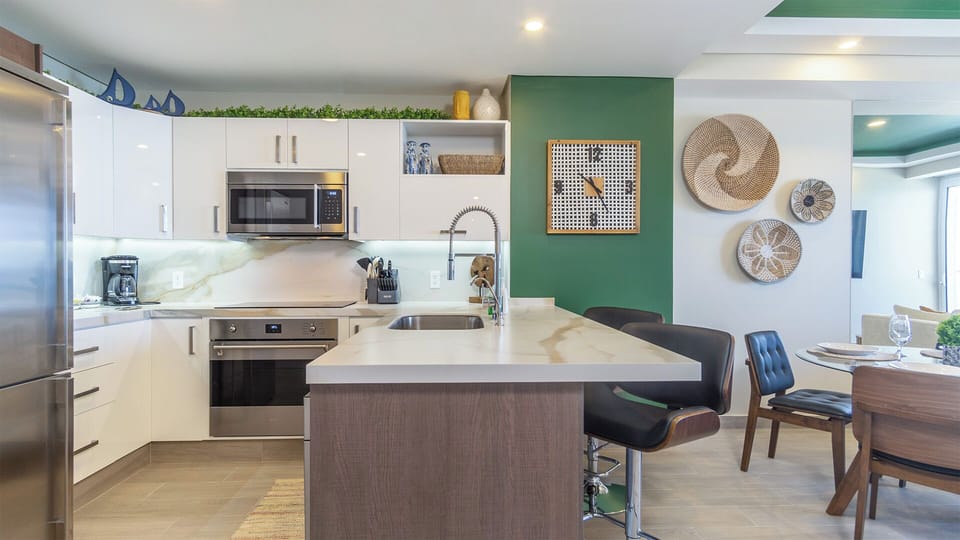 The kitchen is roomy and complete.