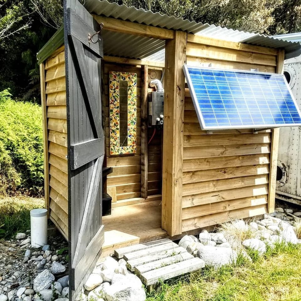 Camp shower. Solar powered, gas califont.