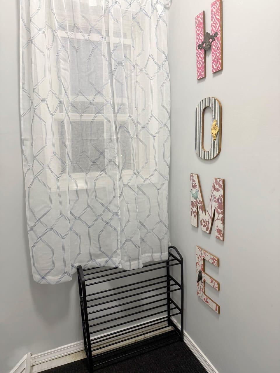 Entry of 2nd floor. Window and shoe rack