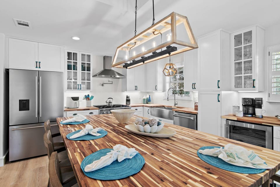 State of the Art New Kitchen with Stainless Steel Appliances with plenty of counter space, overlooking Dining Area & Family Room ~ Great for Entertain