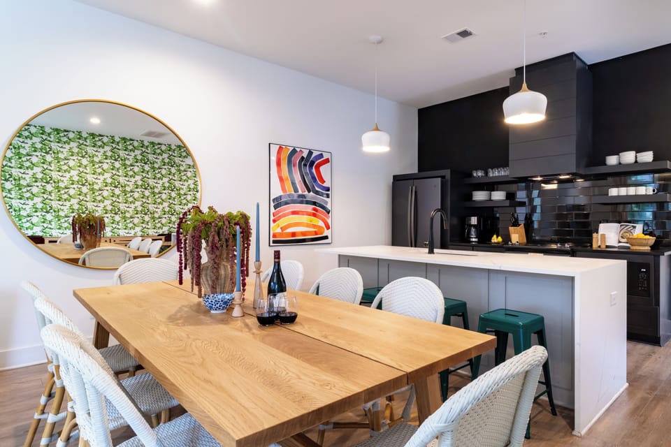 Fully equipped kitchen with modern appliances and spacious kitchen island.