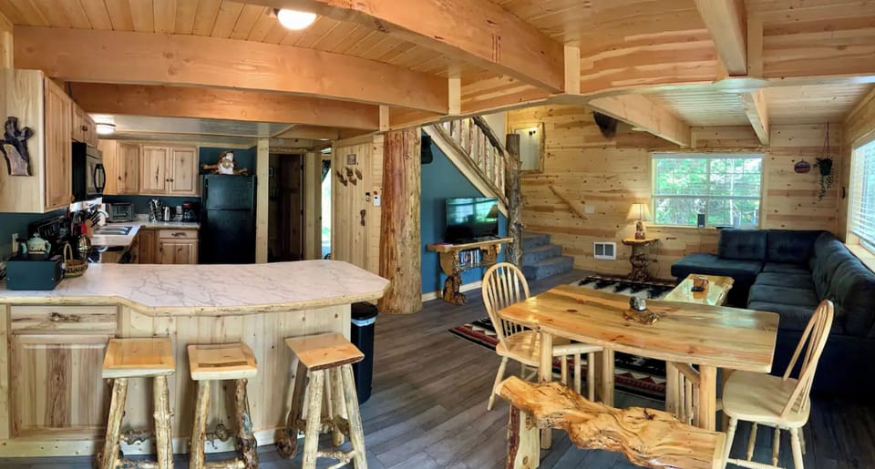 Open living, kitchen, and dining area with plenty of space to gather together.