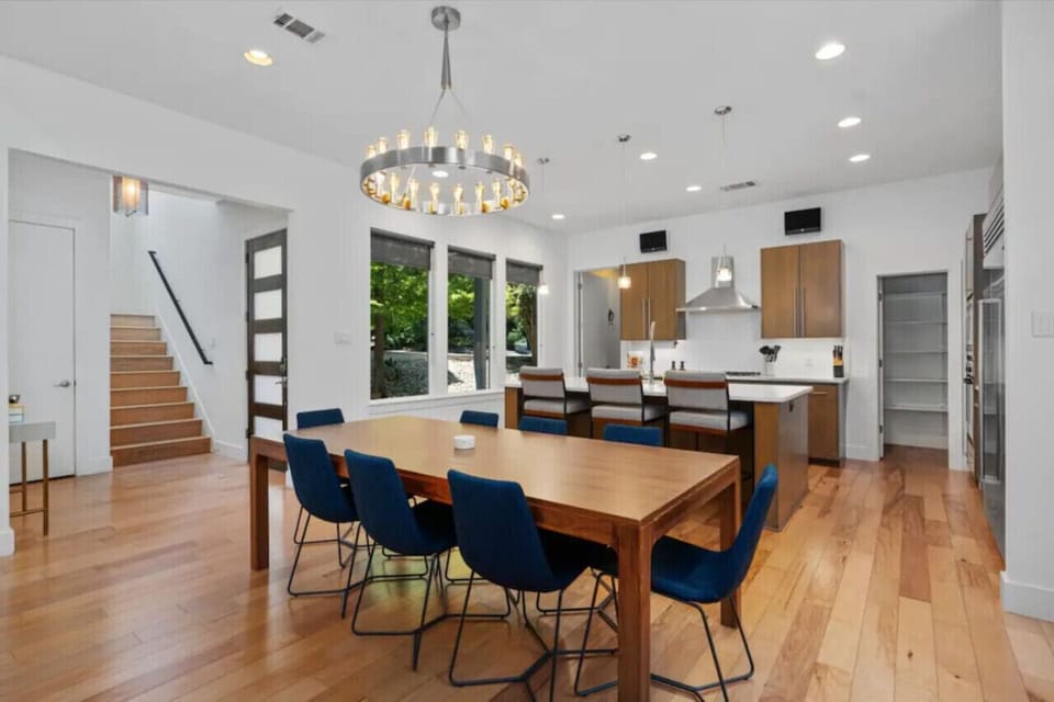 The dining area invites you to share meals with 8 friends/family!