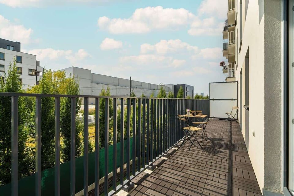 Balcony with garden furniture.