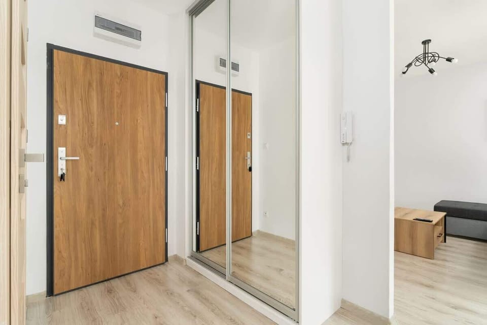 Capacious wardrobe with mirror.