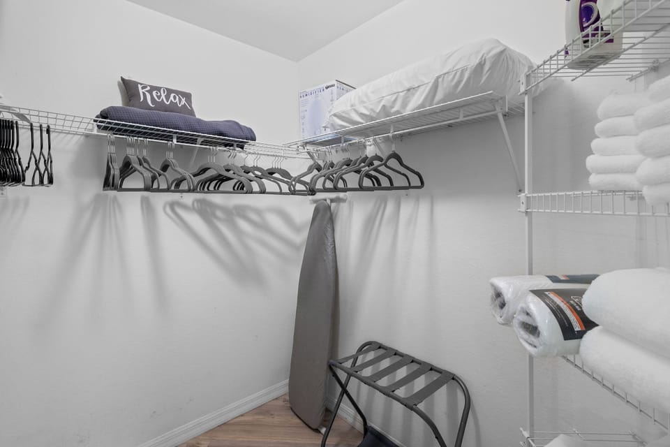Master walk in closet with built in personal safe.