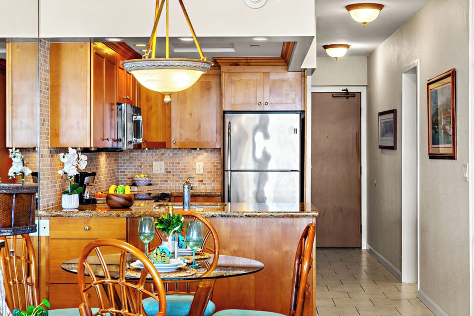 Cook with ease in a thoughtfully designed, fully equipped kitchen. Featuring modern appliances, ample counter space, and all the essentials you need, from quick island breakfasts to full home-cooked dinners.