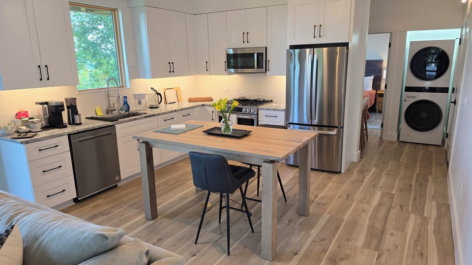 Fully stocked kitchen and dining area. Washer and Dryer for your use (or not :)