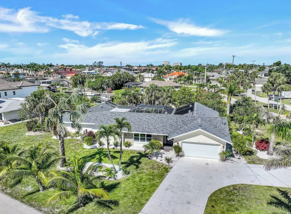 Front view with driveway