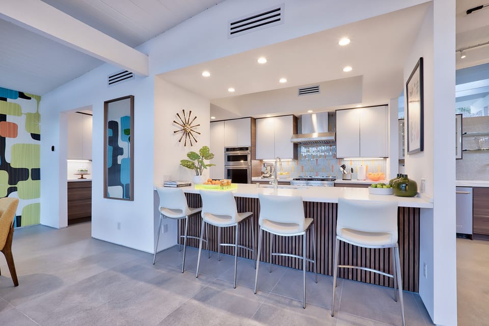 New kitchen- 10' island. KitchenAid gas range, 48" fridge/freezer, 2 D/Ws.