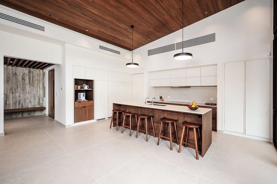 Main entrance to kitchen. interior dining room and family room