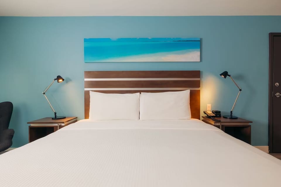Sink into crisp linens and drift off in quiet comfort.