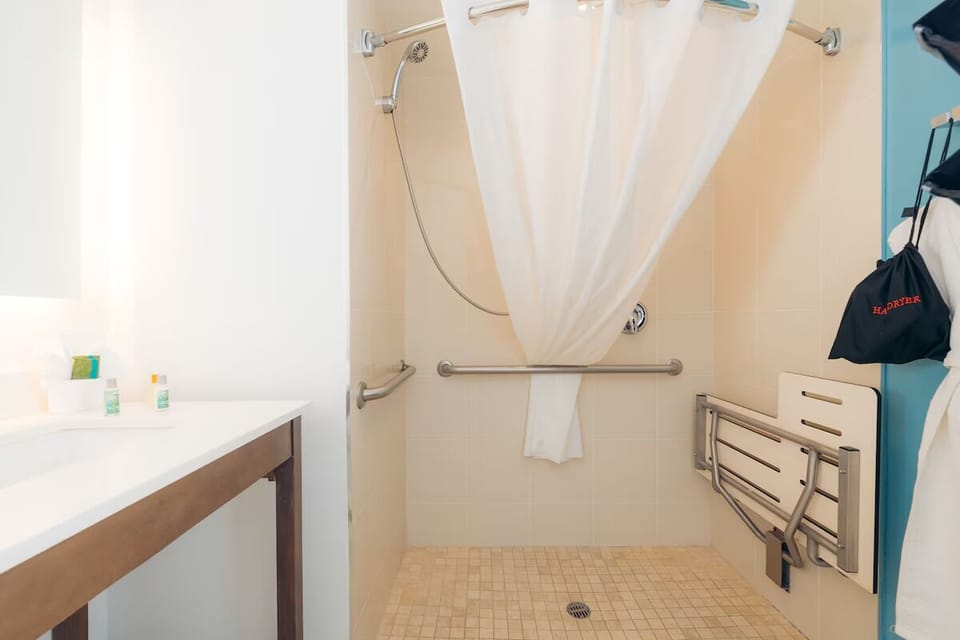 Enjoy a safer, accessible shower with supportive grab bars.