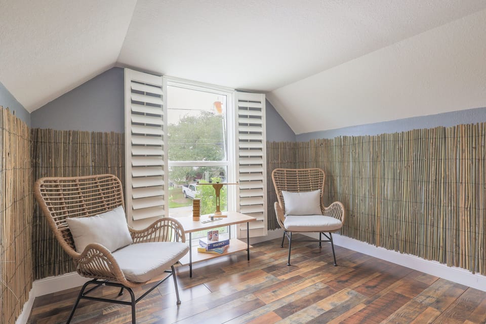 Unwind in our game room, boasting cozy chairs, perfect for fun and relaxation.