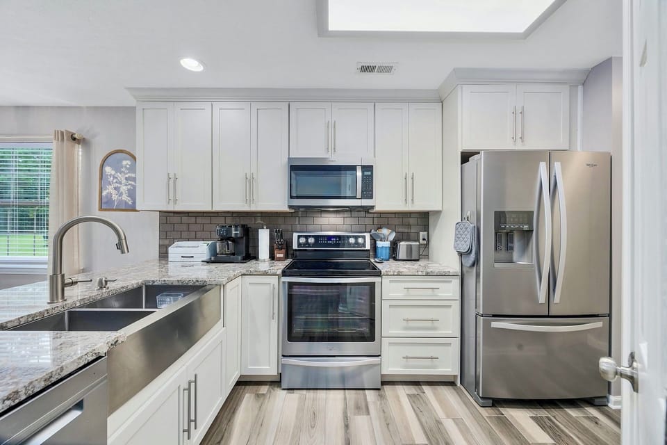 New sunny kitchen with all of the essentials. Dining-in options made easy.