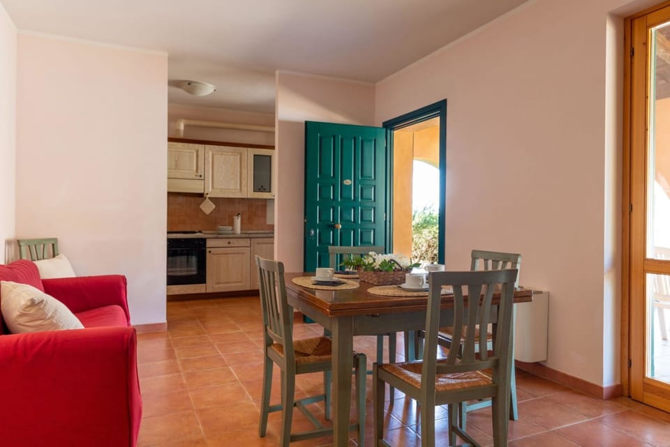 Nice three-room apartment in typically Tuscan style on the ground or first floor of approximately 50 m2 located in the area around the swimming pools.It is composed of a living room with dining area, flat-screen television and sofa bed, kitchenette equip Apartment in Tuscany