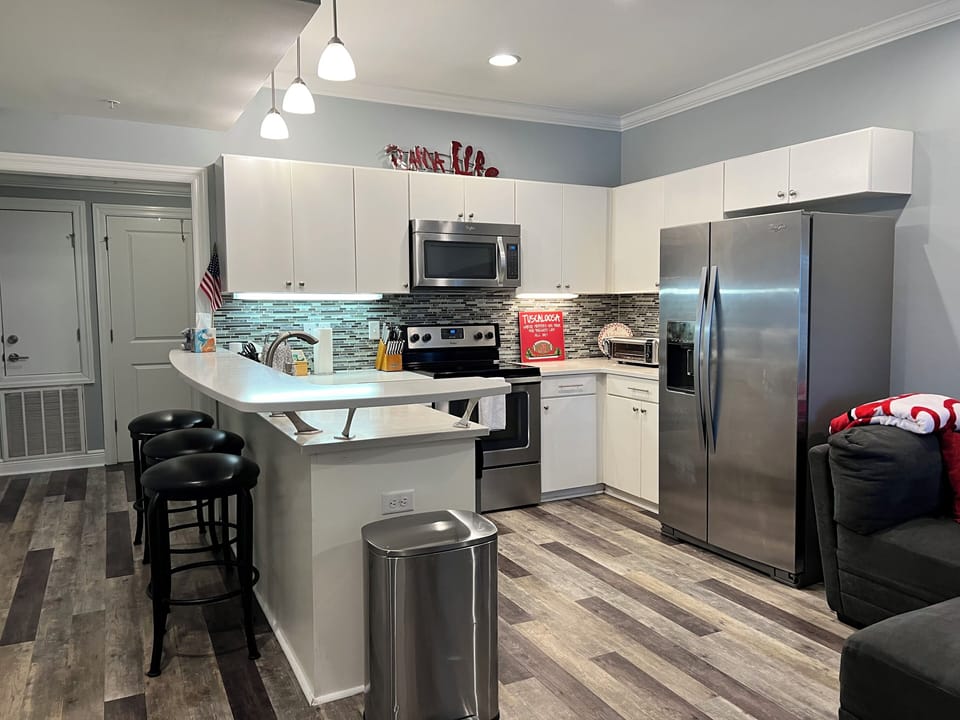 Kitchen with bar seating for 3