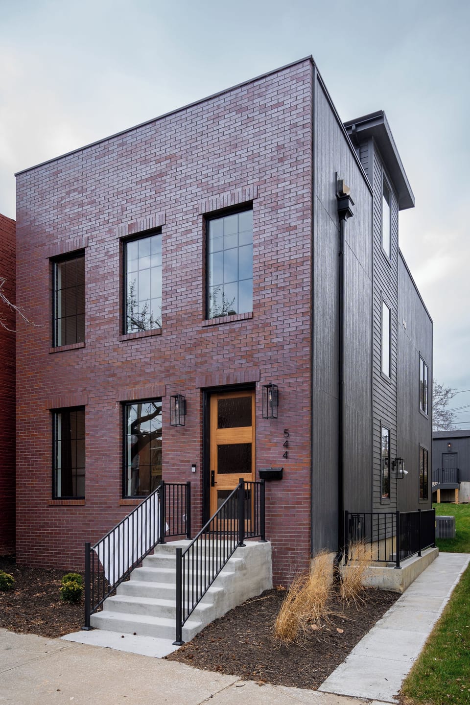 Contemporary brick façade with clean lines and modern finishes, this basement apartment is in the historic Columbus Park neighborhood.