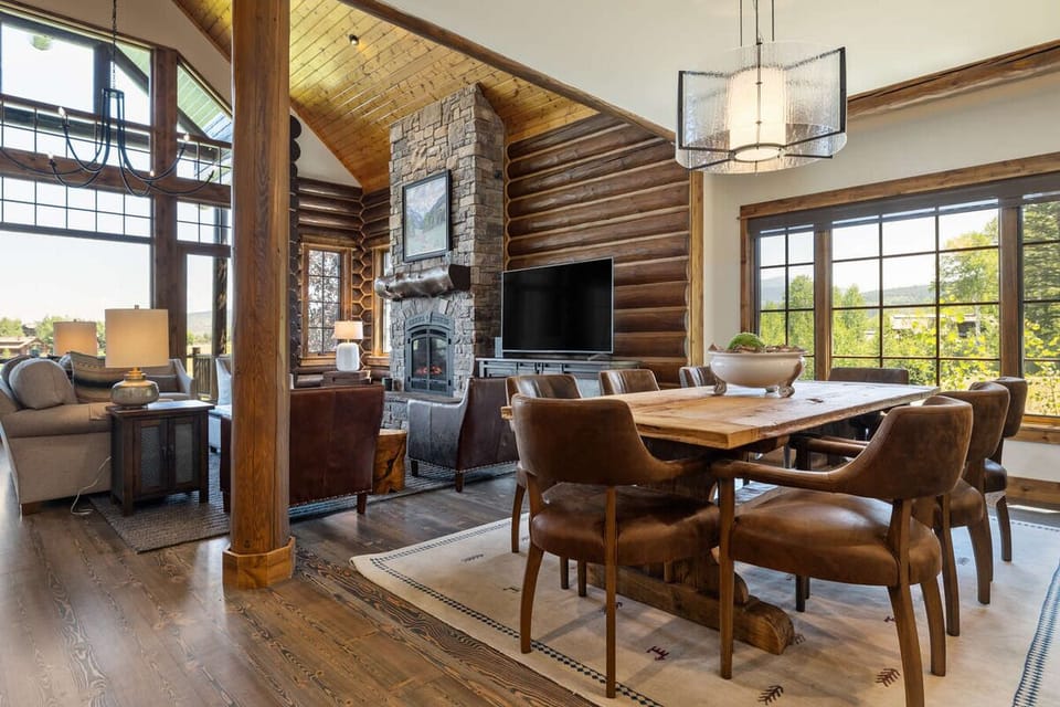 Unwind together by the stone fireplace in rustic comfort.