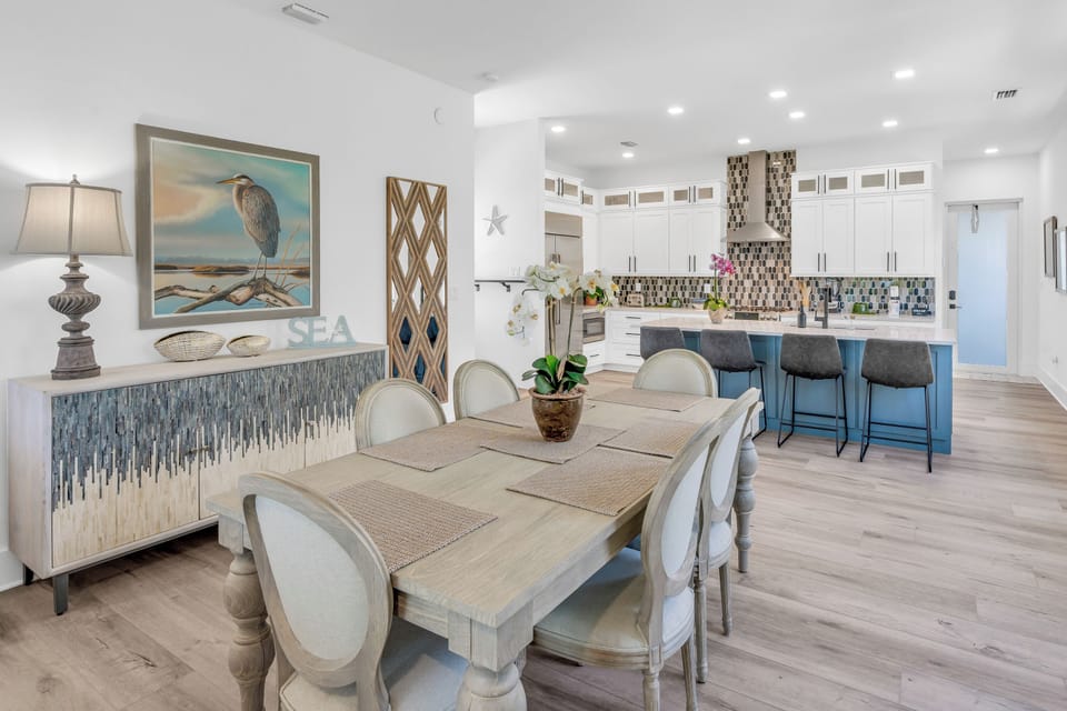 Elegant dining area and gourmet kitchen made for family gatherings