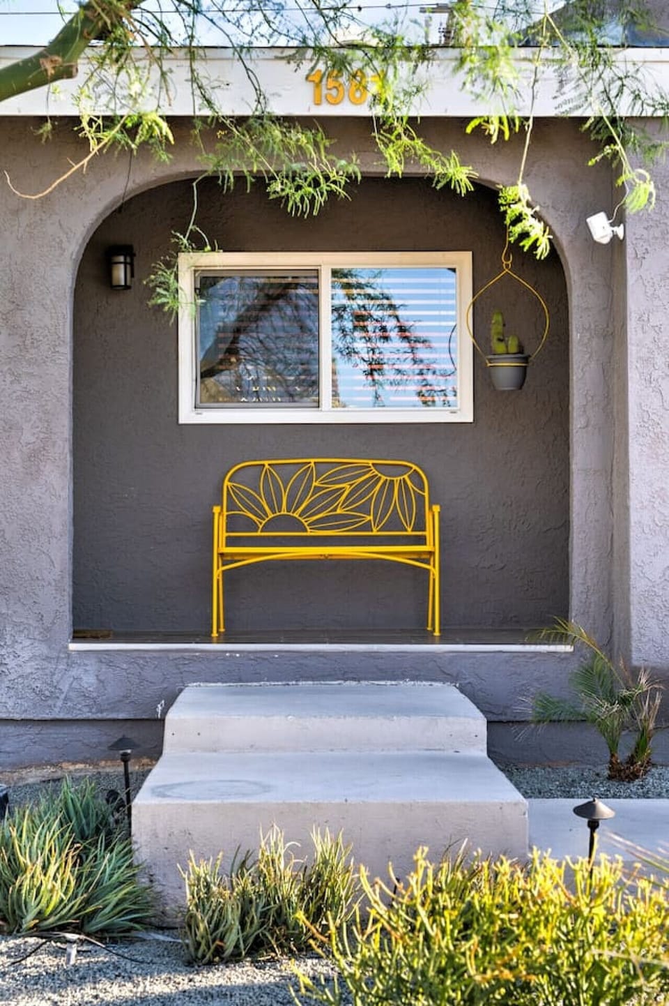 A charming pop of yellow to welcome you home.
