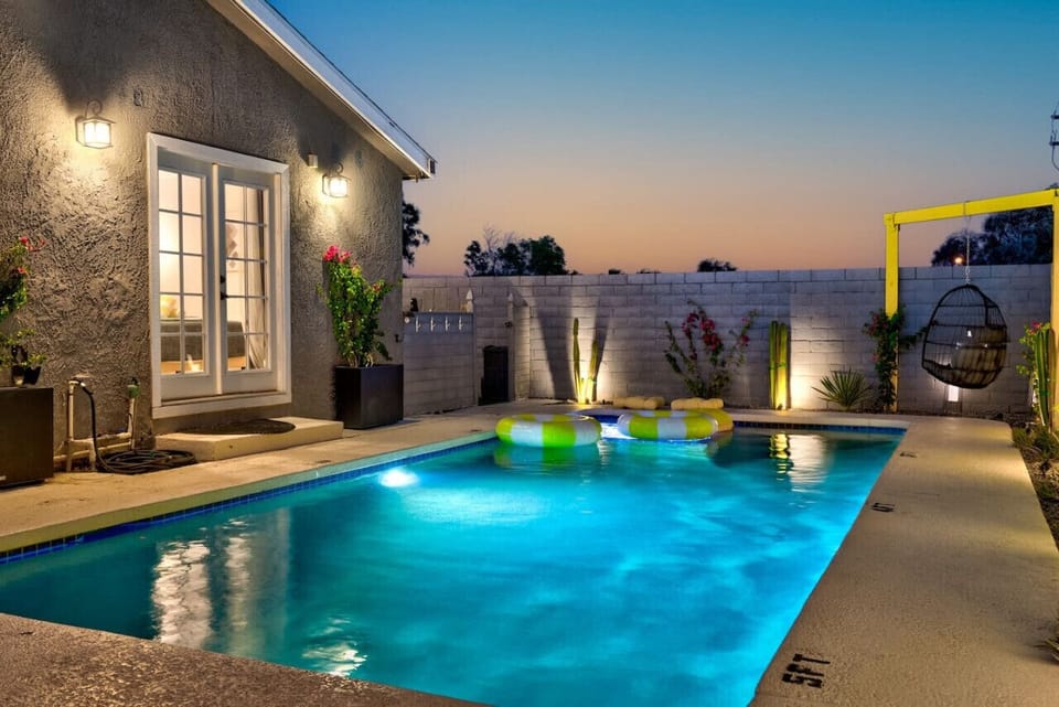 Watch the sunset while relaxing by the pool — pure vacation vibes! (Floaties not provided in the property)